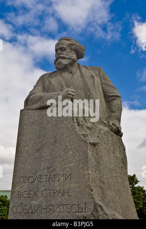 Granite Statue Monument to Karl Mark with political slogan 'Workers of the world, unite!” near the Bolshoi Theatre Moscow Russia Stock Photo