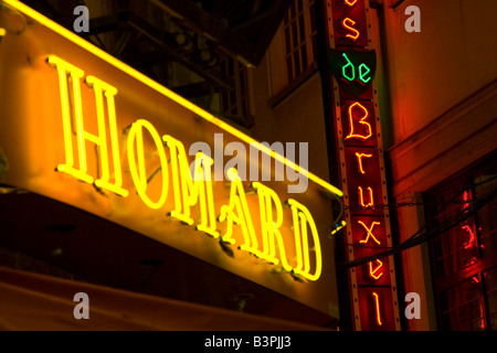 Neon lit exteriors of Restaurants along the Rue des Bouchers, Brussels Belgium Stock Photo