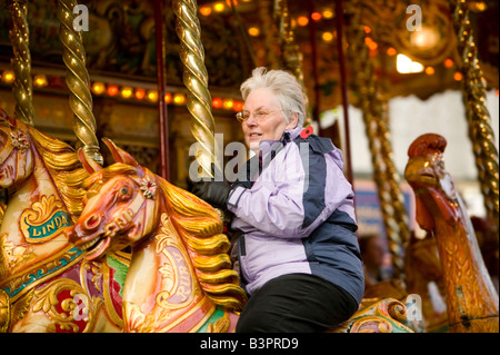 Gallopers Fairground Ride the golden gallopers and old fair ground ride at loughborough UK Stock ...