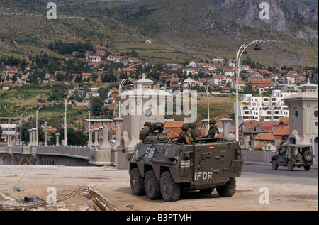 MOSTAR, JUNE 1996', IFOR TROOPS (NATO-LED IMPLIMENTATION FORCE FOR BOSNIA AND HERZEGOVINA)  PATROL IN AN APC, 1996 Stock Photo