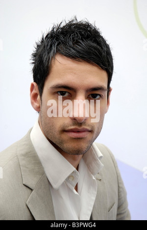 Portrait of Handsome young man looking at camera. Stock Photo