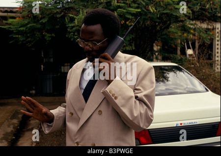 GOVERNMENT MINISTERS TAKING REFUGE IN THE FRENCH EMBASSY AFTER THE COUP, SPEAKING ON THEIR MOBILE PHONE Stock Photo