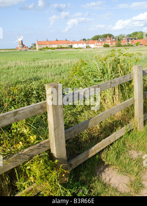 Looking out over fields to Cley Mill at Cley Next the Sea in Norfolk, East Anglia England UK Stock Photo