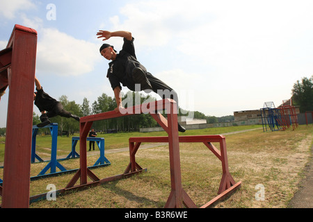 special troops soldiers pass maroon berets exam Stock Photo