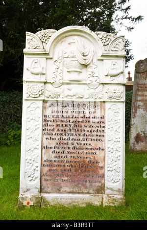 John Peel's grave in the small churchyard at Caldbeck Cumbria the Lake District England UK Stock Photo