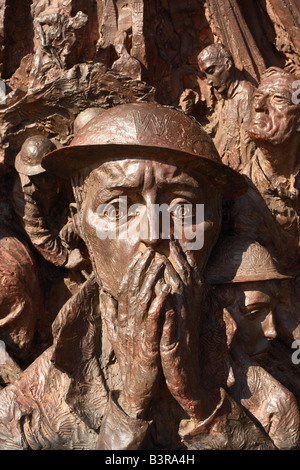 London The Battle of Britain Monument by Paul Day detail showing face of Air Raid Warden located on the Embankment London Stock Photo