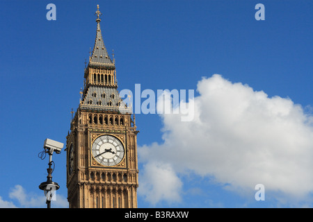 London England CCTV security video camera watching over Big Ben in Westminster London with copyspace Stock Photo