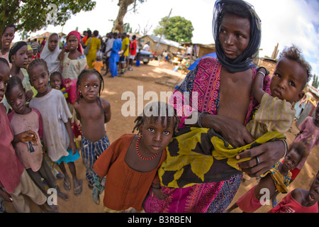 Wodaabe Fulani woman and children  - nomads from Niger - at a village near Abuja, Nigeria, as seen through a fisheye lens Stock Photo