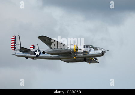 Old WWII bomber plane North American B-25 J Mitchell flying during an air show, Anchorage, Alaska, Usa Stock Photo