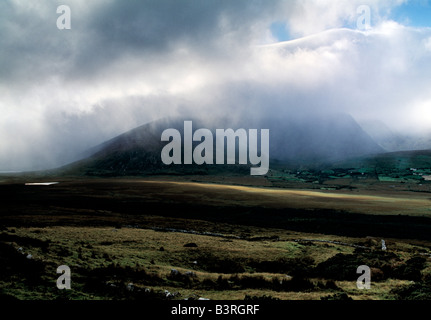 irelands second highest mountain range covered in cloud mist rain, heavens reflexes, weather patterns on irish landscape Stock Photo