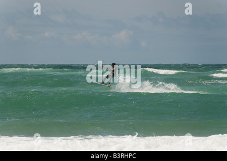 A man kite-surfing in the Atlantic sea at Carteret, Normandy, France Stock Photo