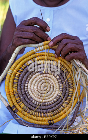 Aboriginal woman weaving pandanus mat Arnhemland Australia Stock Photo ...