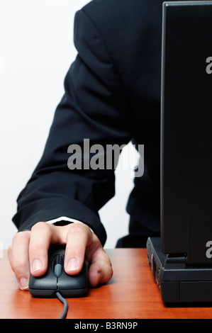 Businessman Using a Computer Mouse Close Up Stock Photo