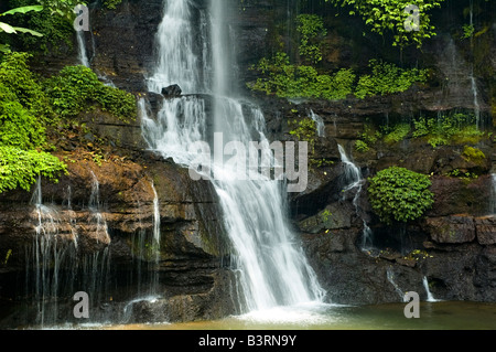 Beautiful scenery of Curug Orok Waterfall in Indonesia rainforest Stock Photo