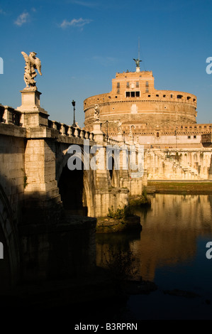 Ponte Sant Angelo bridge over Tiber river with Mausoleum of Hadrian AD 139 also known as Castel Sant’Angelo, Rome Italy Stock Photo