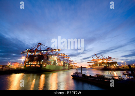 Container ships in the Eurogate container terminal left and the terminal HHLA Burchardkai CTB right respectively Stock Photo