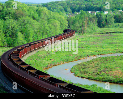 A COAL TRAIN WINDS THROUGH THE VALLEY OF JOHNSTOWN FLOOD NATIONAL MEMORIAL SITE, HISTORIC FLOOD IN 1889; PENNSYLVANIA, USA Stock Photo