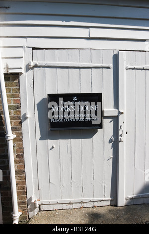 National Trust sign on old Wooden Doors at Monk's House, Rodmell, East Sussex Stock Photo