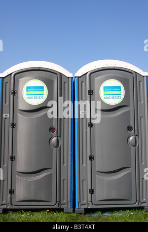 Portable toilet facilities at an outdoor event.