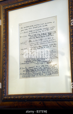 England, Oxford. A paper signed by The Inklings in The Eagle and Child pub. During the 1950s and 1960s, CS Lewis and JRR Tolkein would meet here, along with their circle of literary friends known as 'The Inklings' to read and discuss their latest work, including the Chronincles of Narnia and The Lord of the Rings. Stock Photo