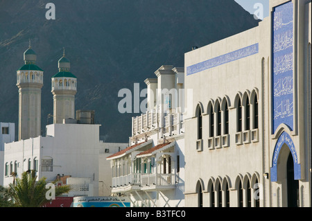 Oman, Muscat, Mutrah. Mutrah Corniche Mosque and Restored Merchant Houses Stock Photo