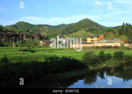 Linxi River of Sanjiang County at Chengyang, China looking out over rice paddy fields Stock Photo