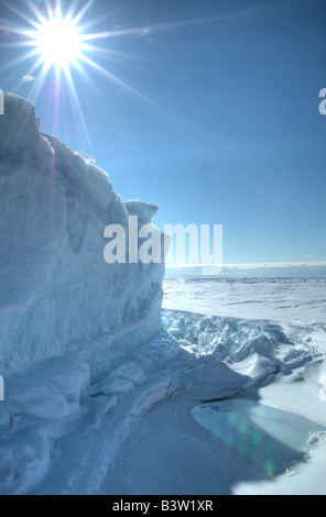 An Iceberg on Cobourg Island in the Canadian Arctic melting in the sunlight. Stock Photo