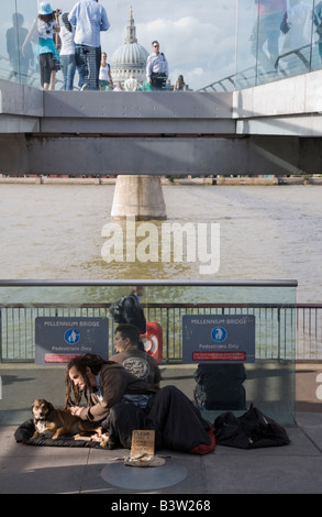 Homeless person, Millenium Bridge, London Stock Photo