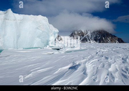 An Iceberg on Cobourg Island in the Canadian Arctic melting in the sunlight. Stock Photo