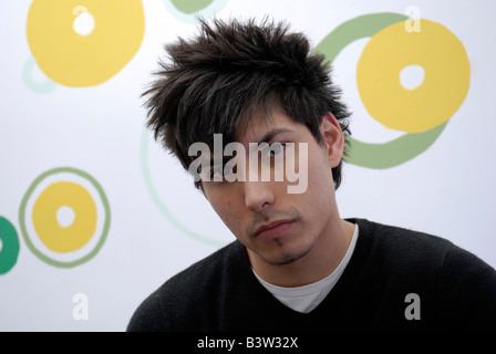 Cool young man in a funky modern office interior Stock Photo