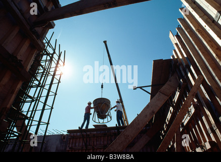 Pouring concrete at a construction site of a water treatment plant Stock Photo