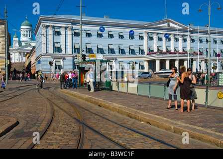 People waiting for tram at Kauppatori stop in Helsinki Finland Europe Stock Photo