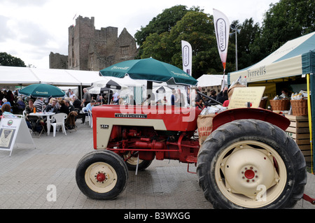 International tractor on display in the grounds of Ludlow Castle at Ludlow Food Festival, Shropshire Stock Photo