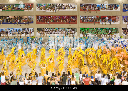 One of the samba schools on its way down the parade strip at the carnival in the Rio Sambadrome. Stock Photo