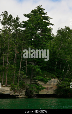 Lake Superior Rocky shoreline in Michigan  vertical hi-res Stock Photo