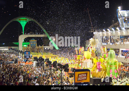 One of the floats and samba school on its way down the parade strip at the carnival in the Rio Sambadrome. Stock Photo