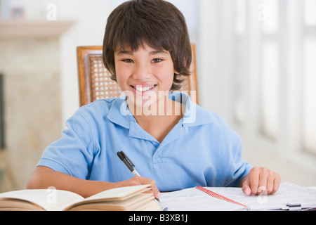 Boy Doing His Homework Stock Photo