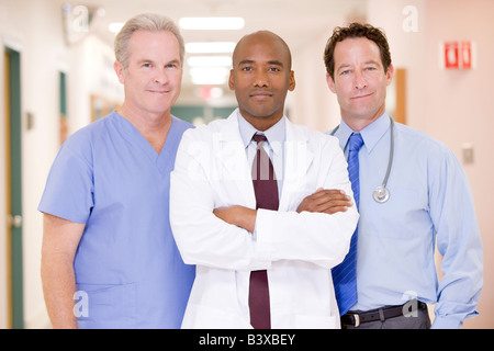 Doctors Standing In A Hospital Corridor Stock Photo