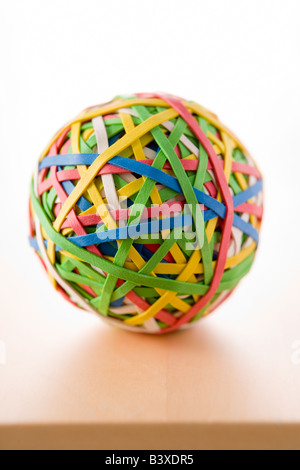 Rubber Band Ball Sitting On Desk Stock Photo