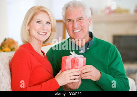 Mature Couple At Christmas Stock Photo