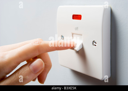 Close Up Of Switch Being Activated Stock Photo