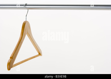 Single Coat Hanger On Rail Stock Photo