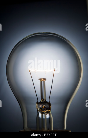 Close-Up Of Illuminated Light Bulb Stock Photo