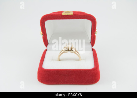 Diamond Engagement Ring in red box on white background Stock Photo
