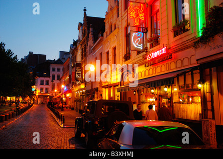 Alley of seafood restaurants near St Catherine church Brussels Belgium Stock Photo