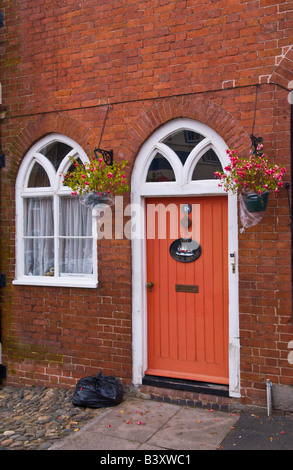 Window and front door with glazed fanlight of townhouse in Ludlow Shropshire England UK