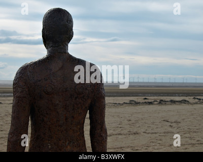 Another Place detail from one of 100 cast Iron statues installed on Crosby Beach near Liverpool artist Antony Gormley Stock Photo