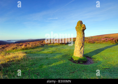 The ancient granite memorial of Bennetts Cross on Dartmoor National Park in South Devon England Stock Photo