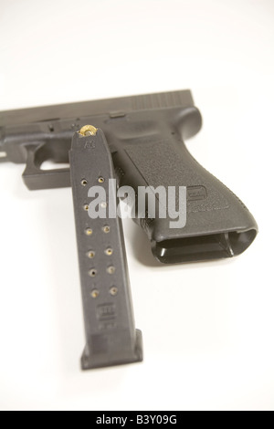 Glock Model 22 .40 caliber pistol with the 15 round magazine removed. Stock Photo