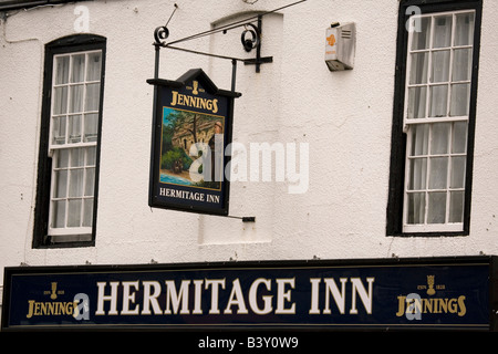 The facade of the Hermitage Inn public house in Warkworth in Northumberland. This is a typical British pub facade. Stock Photo